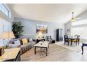 Bright living room with vaulted ceilings and ample natural light at 7971 W Montebello Ave, Glendale, AZ 85303