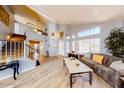 Spacious living room with high ceilings, modern floors, and large windows at 7971 W Montebello Ave, Glendale, AZ 85303