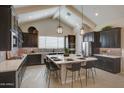 Spacious kitchen featuring a large center island, modern appliances, and ample cabinetry at 20445 W Rovey Ave, Buckeye, AZ 85396