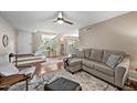 Cozy living room with hardwood floors, neutral color scheme, and comfortable seating at 5632 S Hurricane Ct # C, Tempe, AZ 85283
