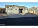 Well-maintained single story home with a two-car garage and a xeriscaped front yard at 8512 W Tuckey Ln, Glendale, AZ 85305