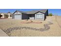 Charming single story home featuring low maintenance rock yard with mature landscaping at 8512 W Tuckey Ln, Glendale, AZ 85305