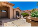 Inviting outdoor patio featuring comfortable seating, ideal for relaxing and enjoying the beautiful weather at 16151 W Fairmount Ave, Goodyear, AZ 85395