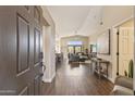 Inviting entryway that offers a view to the spacious living room, dining area and kitchen at 4932 S Verbena Ave, Gilbert, AZ 85298