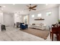 Bright living area with tile floors and modern furniture at 8336 E Idaho Ave, Mesa, AZ 85209