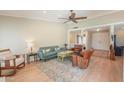 Bright and spacious living room with comfortable seating, ceiling fan, and stylish decor at 8379 E San Salvador Dr, Scottsdale, AZ 85258