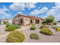 Attractive single-Gathering home showcasing desert landscaping, stone accents, and covered porch at 1919 S Granite St, Gilbert, AZ 85295