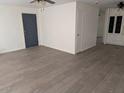 Open concept room features durable flooring, neutral paint palette, and natural lighting at 2630 E Beverly Ln, Phoenix, AZ 85032