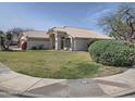 Attractive desert home boasting a spacious lawn and tiled roof, perfect for curb appeal at 4172 E Graythorn Ave, Phoenix, AZ 85044