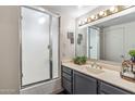 Bright bathroom with modern shower, vanity and ample lighting, offering a clean and functional space at 6928 E 3Rd St, Scottsdale, AZ 85251