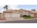 Charming two-story home featuring a well-manicured lawn and a spacious two-car garage at 1150 E Tyson St, Chandler, AZ 85225