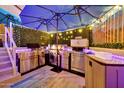 Well-equipped outdoor kitchen with stainless steel appliances, ideal for al fresco dining and entertaining at 24066 N 167Th Ln, Surprise, AZ 85387