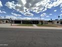 Charming home featuring a landscaped front yard and inviting walkway at 6207 W Orange Dr, Glendale, AZ 85301