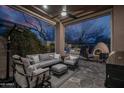 Outdoor patio with comfortable seating, ceiling fan and BBQ at 6703 E Soaring Eagle Way, Scottsdale, AZ 85266