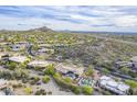 Expansive desert property featuring a pool, spa, and mature landscaping at 7260 E Eagle Crest Dr # 13, Mesa, AZ 85207