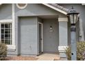 Welcoming front entrance with updated fixtures, featuring the house number at 860 N Mcqueen Rd # 1184, Chandler, AZ 85225