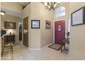 Welcoming foyer with tile flooring, high ceilings, and ample natural light at 9954 W Mohawk Ln, Peoria, AZ 85382