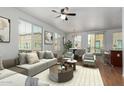 Bright living room with a ceiling fan, natural light and modern furniture at 18250 N Cave Creek Rd # 147, Phoenix, AZ 85032
