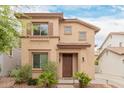 Charming two-story home with a well-manicured front yard at 19043 E Seagull Dr, Queen Creek, AZ 85142
