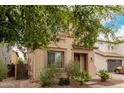 Charming two-story home with a well-manicured front yard and a two car garage at 19043 E Seagull Dr, Queen Creek, AZ 85142
