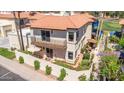Beautiful two-story home featuring desert landscaping, a private balcony, and an inviting outdoor patio at 8841 S 51St St # 1, Phoenix, AZ 85044