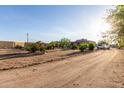 A spacious desert landscape and yard, showcasing privacy and natural surroundings at 20420 N 22Nd St, Phoenix, AZ 85024