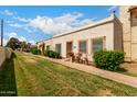 Beautiful single-story home displaying a xeriscaped front yard, quaint walkway and light stucco facade at 3109 W Loma Ln, Phoenix, AZ 85051
