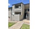 Apartment exterior with covered balconies, stucco siding, and direct TV dishes at 533 W Guadalupe Rd # 1110, Mesa, AZ 85210