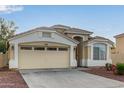 Single-story home with a two-car garage, tile roof, and neutral-toned exterior paint, ideal for easy living at 7215 N 76Th Ave, Glendale, AZ 85303