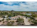 Picturesque aerial shot of the estate, highlighting the mature trees, outdoor spaces, and beautiful scenery at 9053 N 123Rd St, Scottsdale, AZ 85259