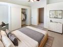 Serene bedroom featuring a walk-in closet and ample natural light at 10101 N 91St Ave # 162, Peoria, AZ 85345