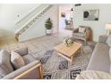 Bright living room with modern furnishings and access to the dining area at 10101 N 91St Ave # 162, Peoria, AZ 85345