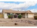 Inviting single-story home with low-maintenance desert landscaping at 1825 S Spruce --, Mesa, AZ 85210