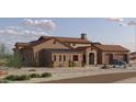 Side view of the stone-accented home featuring a front-facing two-car garage and a light blue vehicle parked in the driveway at 21235Xxx W Elliot Rd, Buckeye, AZ 85326