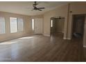 Spacious living room with wood floors and an open layout at 2729 E Carol Ave, Mesa, AZ 85204