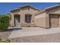 Charming home with a cozy front patio, perfect for enjoying the outdoors with style and comfort at 3662 E Megan St, Gilbert, AZ 85295