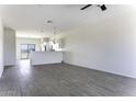 Spacious living room featuring recessed lighting and stylish tile flooring at 3725 N Bandelier Dr, Eloy, AZ 85131