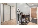 Functional entryway with tile flooring, storage, and convenient access to the rest of the home at 10723 N 80Th Ln, Peoria, AZ 85345