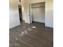 Cozy bedroom with fresh white paint and wood flooring at 120 N Jackson St, Chandler, AZ 85225