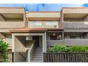 Charming multi-story condo building with a well-maintained exterior and inviting entrance at 1645 W Baseline Rd # 2176, Mesa, AZ 85202