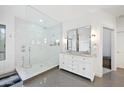 Modern bathroom featuring a glass shower, dual vanity, and contemporary fixtures at 630 S Boulder Ct, Gilbert, AZ 85296