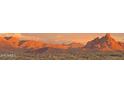 Picturesque mountain range with scenic views under a vibrant sunset sky at 16336 E Ridgeline Dr, Fountain Hills, AZ 85268