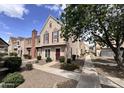 Charming two-story townhome featuring a classic design and inviting curb appeal at 18820 N 34Th Ln # 1, Phoenix, AZ 85027
