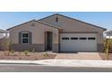 A charming single-story home with a two-car garage, neutral stucco exterior, and low-maintenance desert landscaping at 24493 W Grenadine Rd, Buckeye, AZ 85326