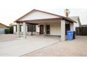 Charming single-story home with a spacious carport and low maintenance desert landscaping at 2738 E Libby St, Phoenix, AZ 85032