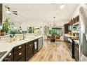 Spacious kitchen featuring stainless steel appliances, ample counter space, and a bright breakfast nook at 3921 W Sheffield Ave, Chandler, AZ 85226