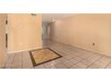 The living room has tile flooring and a patterned tile accent area in the flooring at 461 W Holmes Ave # 224, Mesa, AZ 85210