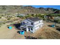A home under construction with mountain views at 3835 W Fox Rd, Laveen, AZ 85339