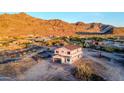 Exterior view of a home under construction with scenic mountain backdrop at 3835 W Fox Rd, Laveen, AZ 85339