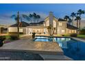 Beautiful backyard with a sparkling pool and ample patio space, perfect for enjoying outdoor living at 3943 E Laurel St, Mesa, AZ 85215